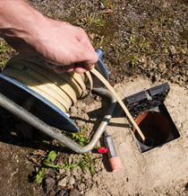 one of our Leisure City plumbers is cleaning a septic tank