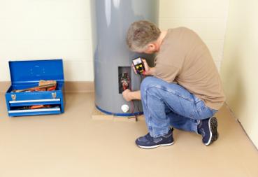 Jim is in the middle of a water heater repair